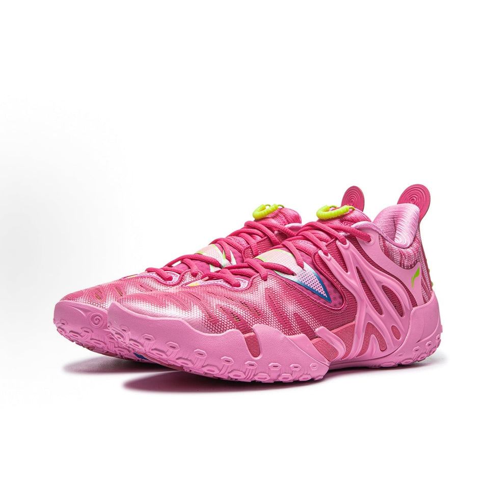 Unisex pink basketball shoe with wavy side panels, lime-green accents and grippy outsole
