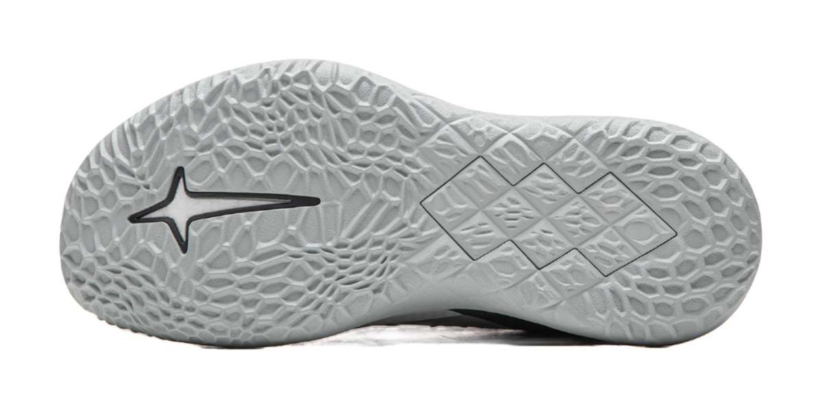 Basketball shoe outsole with light gray traction tread pattern