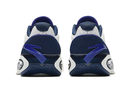 Back view unisex low basketball shoes in navy and white with heel pull tabs