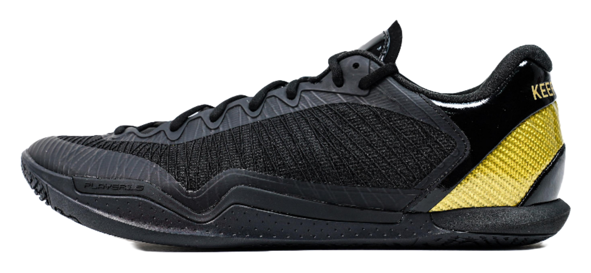 Black low-cut lace-up basketball shoe with textured upper and yellow side panel