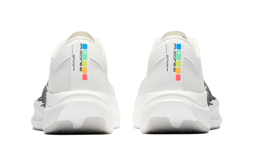 Women’s low-top running shoes, rear view with white heel and colorful Zone 2 graphic