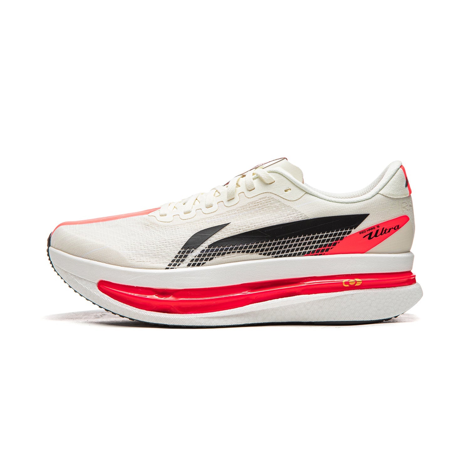 Champagne white running shoe with black side logo and red midsole, lace-up