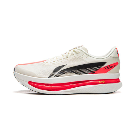 Champagne white running shoe with black side logo and red midsole, lace-up