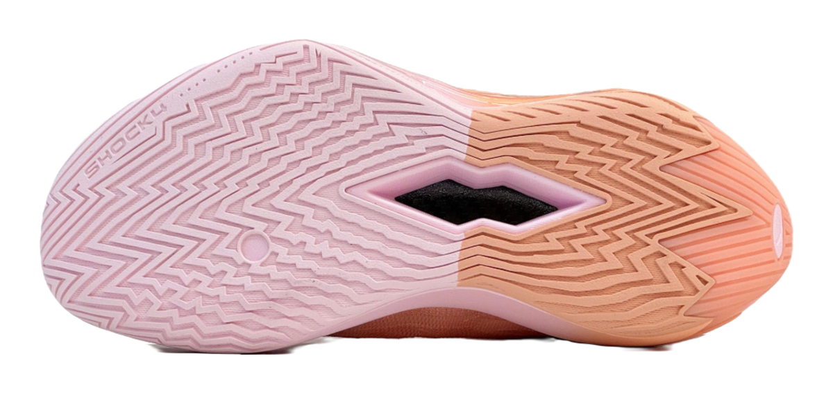 Basketball shoe outsole in light pink with zigzag tread and purple forefoot logo