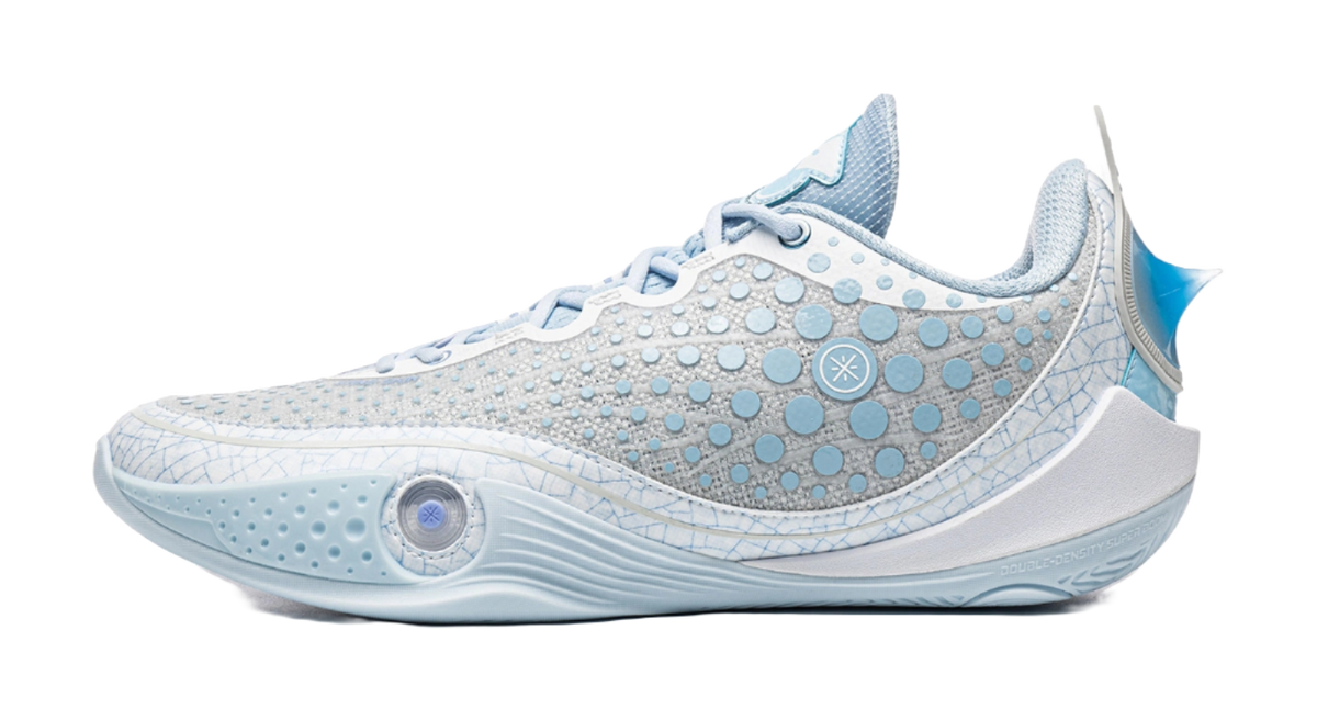 Ice blue low basketball shoe with patterned upper and lace-up front