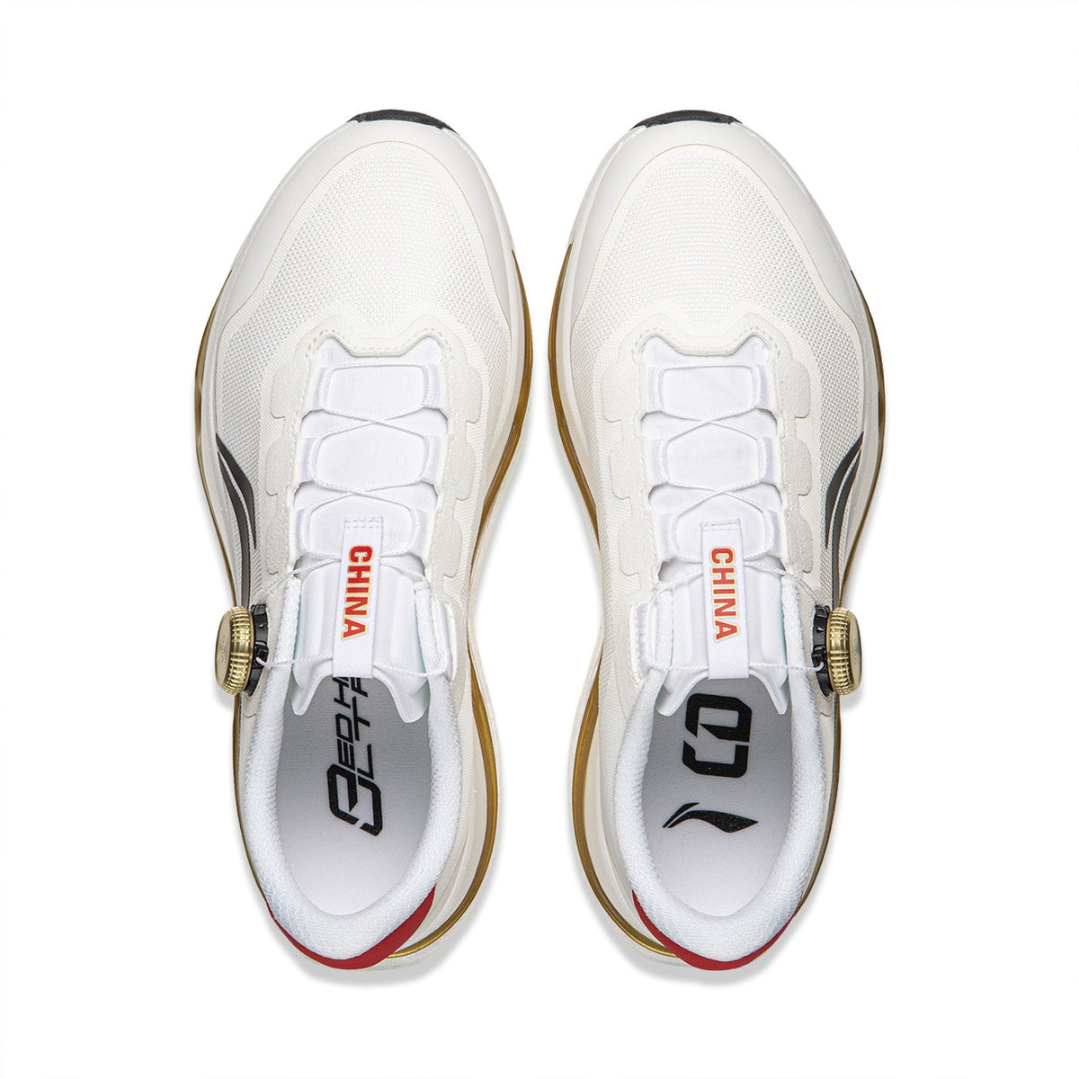 Pair of men's white running shoes, rear view, red “CHINA” tongue labels, gold trim