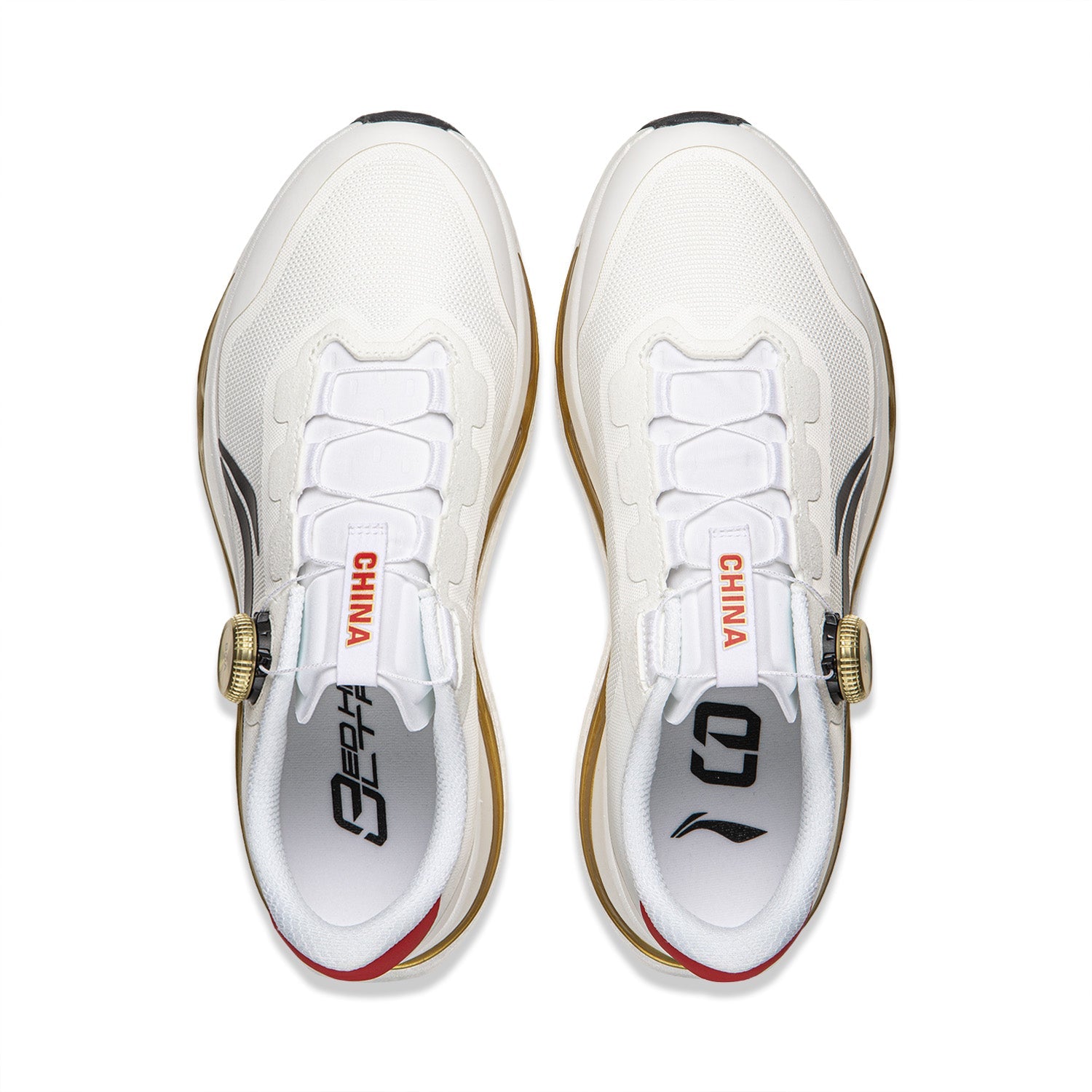 Pair of men's white running shoes, rear view, red “CHINA” tongue labels, gold trim