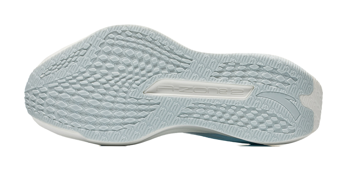 Light blue shoe outsole with textured tread pattern for grip
