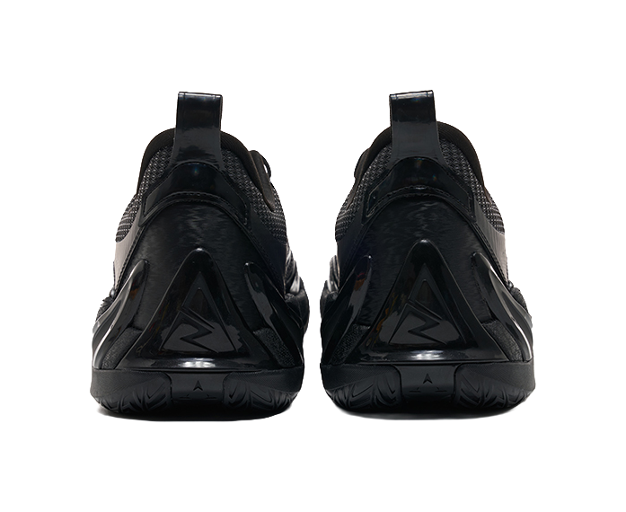 Unisex low-top basketball shoe heels in black with cushioned back and branding