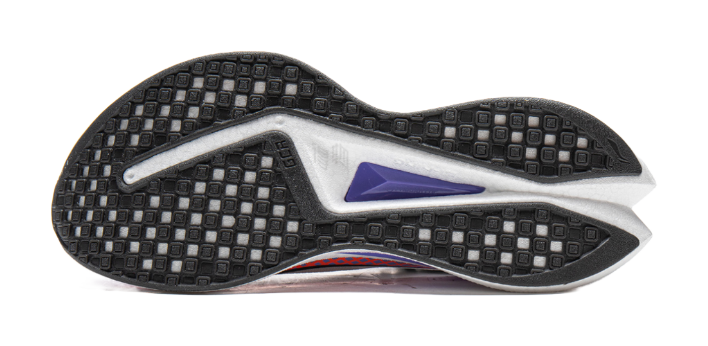 Black rubber outsole tread on white running shoe with purple heel trim