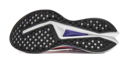 Black rubber outsole tread on white running shoe with purple heel trim