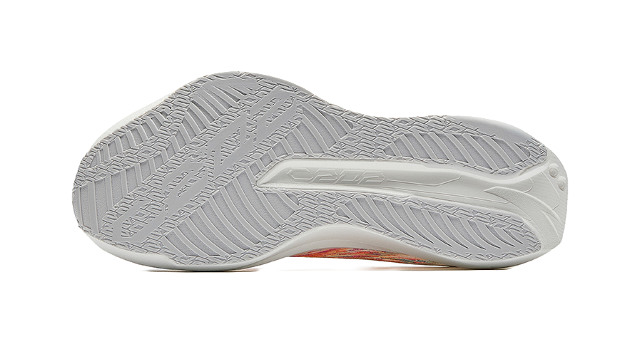 Women’s running shoes, gray textured outsole with traction pattern and white midsole