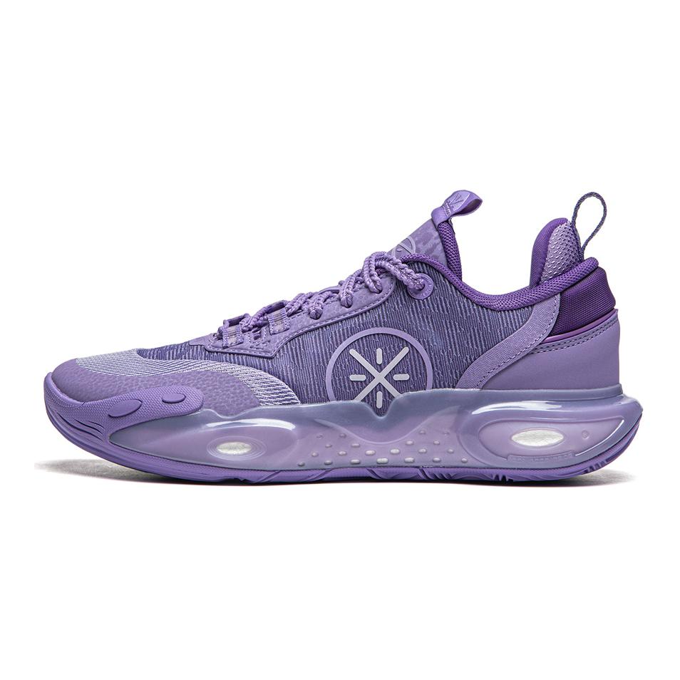 Kids lavender purple basketball shoe, lace-up upper, circular logo, translucent cushioned sole