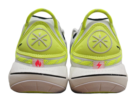 Neon green and white basketball sneaker heel with treaded outsole, rear view