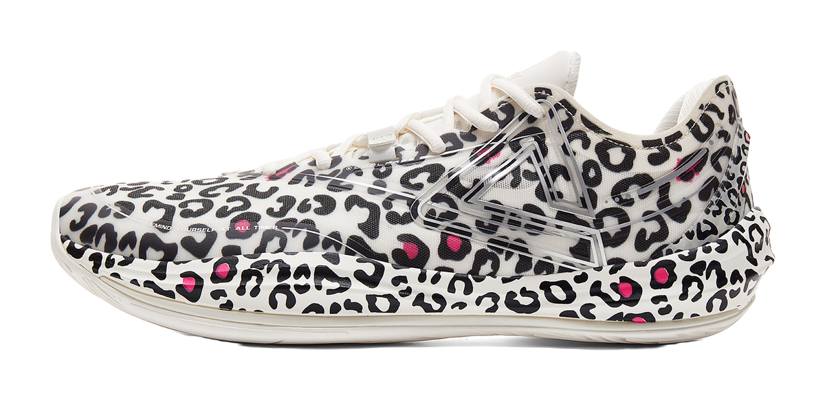Lightweight basketball shoe in white with black leopard print and pink accents, lace-up