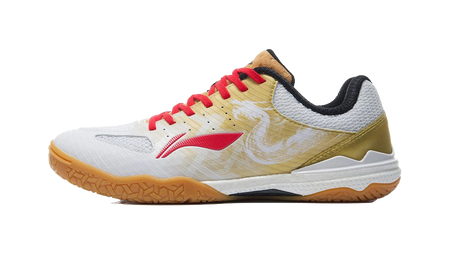 White and gold table tennis shoe with red laces, black heel collar, side view.