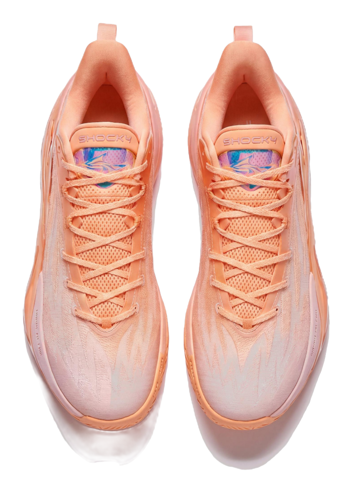Light pink basketball shoe pair with orange laces and cushioned collar