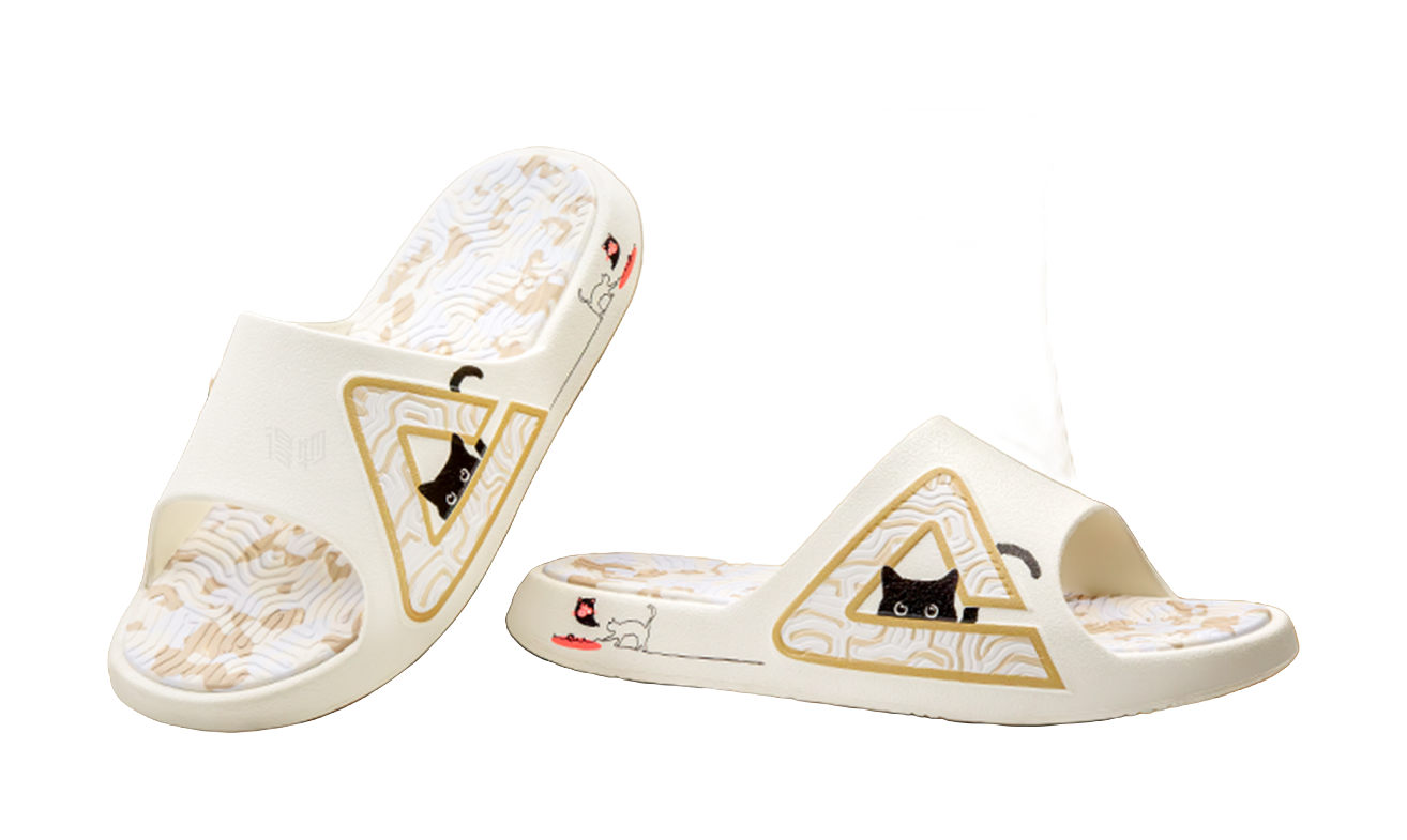 White unisex slide sandal showing triangular cat emblem on the upper