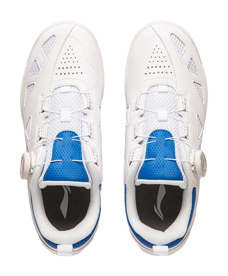 White table tennis shoe toe view with blue inner lining, lace-up, and perforation details.