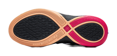 Low basketball shoe outsole view: textured black tread with gum and pink rubber areas.