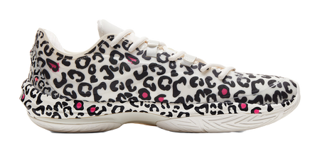 Lightweight basketball shoe, white with black leopard pattern and pink spots, side view