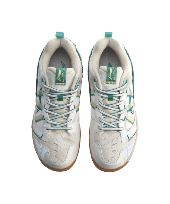 White-and-gray badminton shoes, front view pair, green lace loops and tongue labels