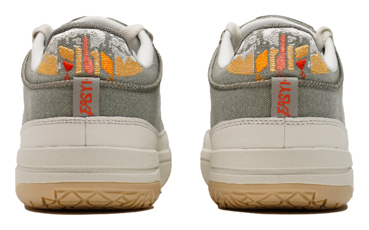 Unisex basketball shoes rear view with olive heel, white midsole, and gum outsole