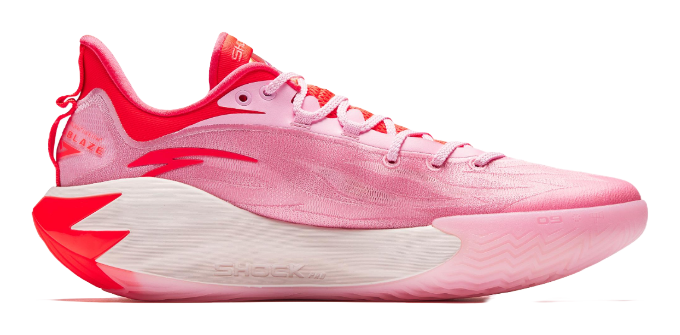 Pink basketball shoe with red trim, lace-up front, and textured midfoot sole