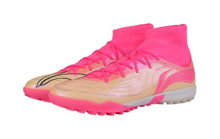 Unisex turf soccer shoe with pink knit collar and lace-up front, white sole