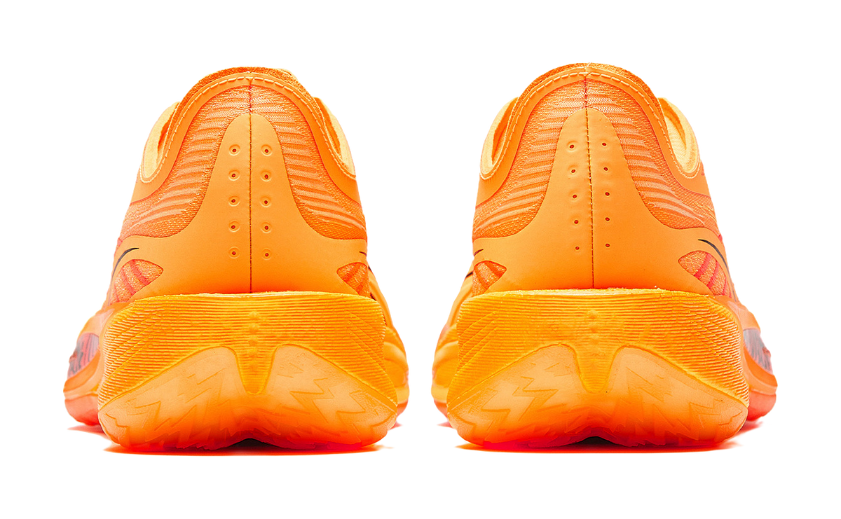 Anta Crazy 5 low-top shoes, rear view with textured cushioned sole in orange/yellow