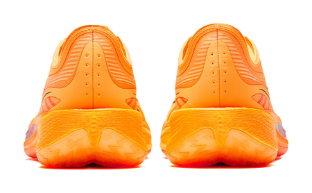 Anta Crazy 5 low-top shoes, rear view with textured cushioned sole in orange/yellow