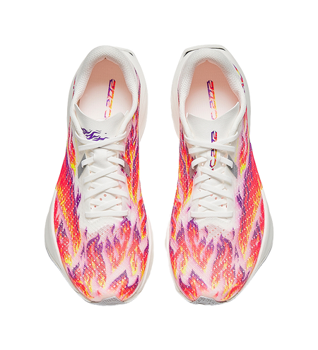 Pair of white lace-up running shoes with multicolor glitter upper and padded collar
