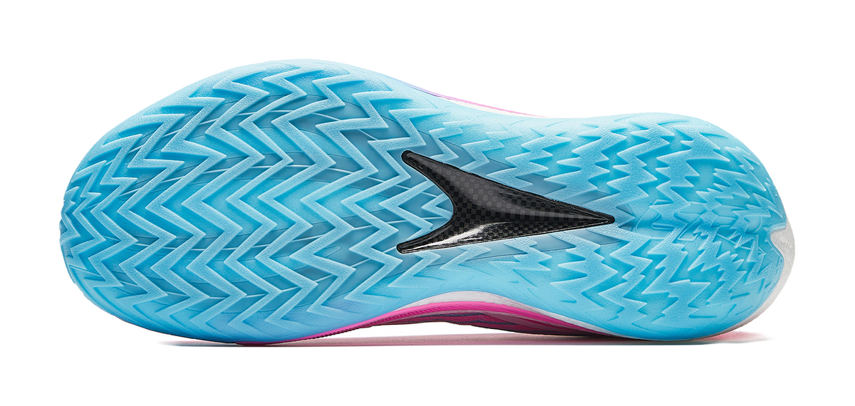 Blue outsole of pink running shoe with textured traction pattern