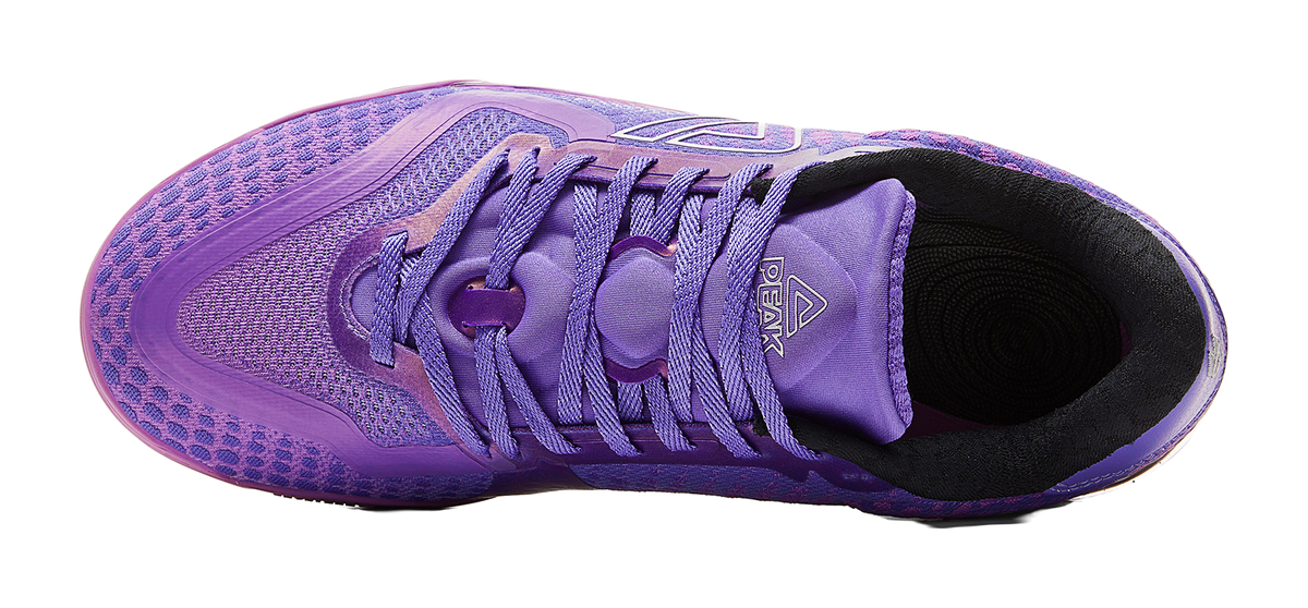Crystal purple basketball shoe viewed from the side with lace loops and PEAK branding