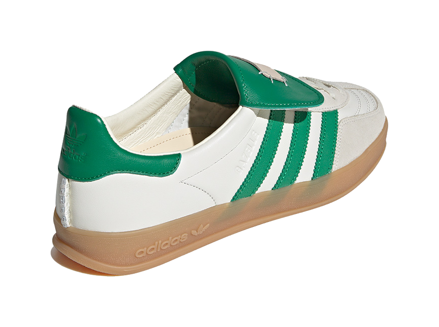 Low-top Gazelle skate shoes with green heel, white upper, lace-up, gum sole