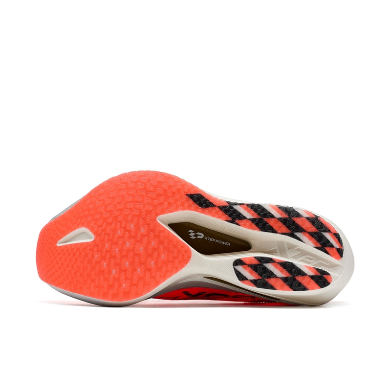 Marathon racing shoe outsole view with orange tread and black-and-gray stripe pattern on side