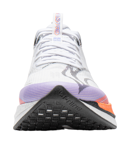 White running shoe close-up with orange-blue embroidery and purple outsole edge