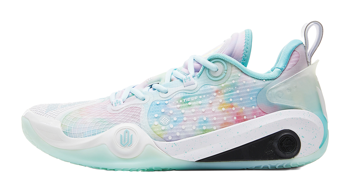 White and light blue basketball shoe with pastel speckle graphic and lace-up design