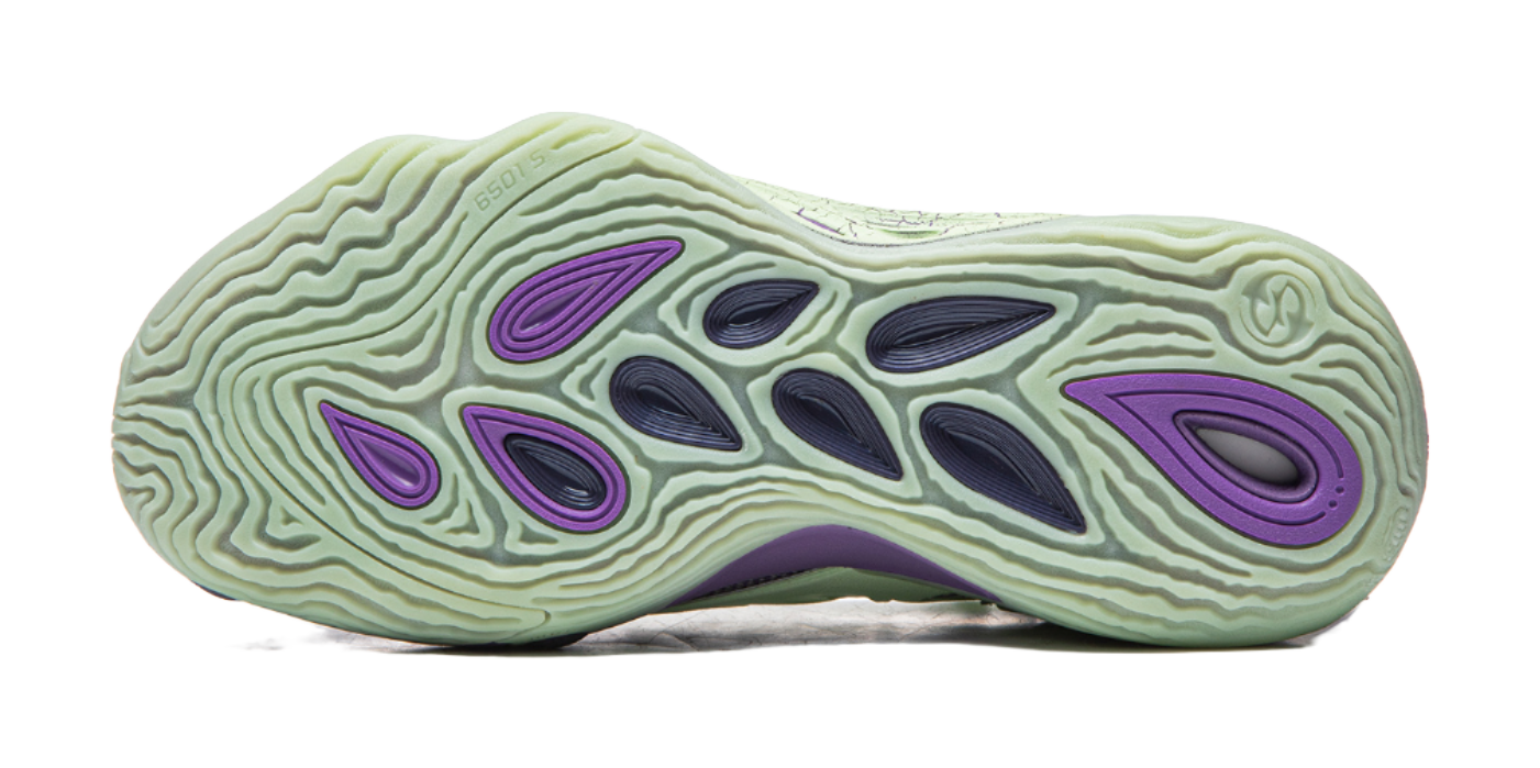 Purple and green basketball shoe outsole with tread pattern on mint rubber