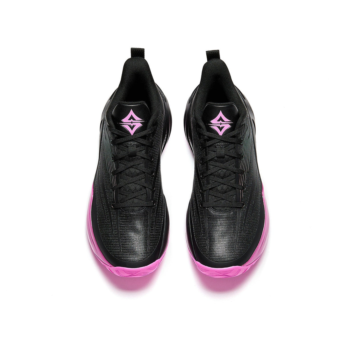 Pair of basketball shoes with black knit uppers and pink outsole trim, top view