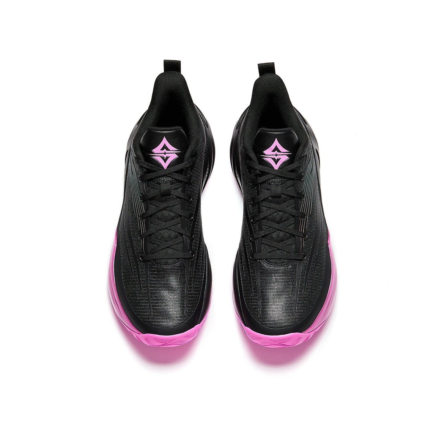 Pair of basketball shoes with black knit uppers and pink outsole trim, top view
