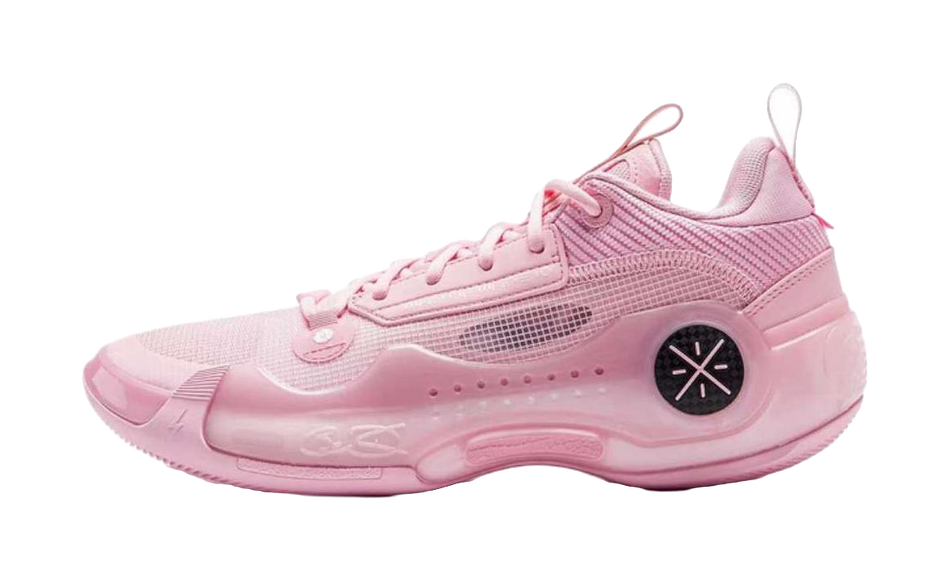 Pink low-top basketball shoe with lace-up knit upper and circular logo detail