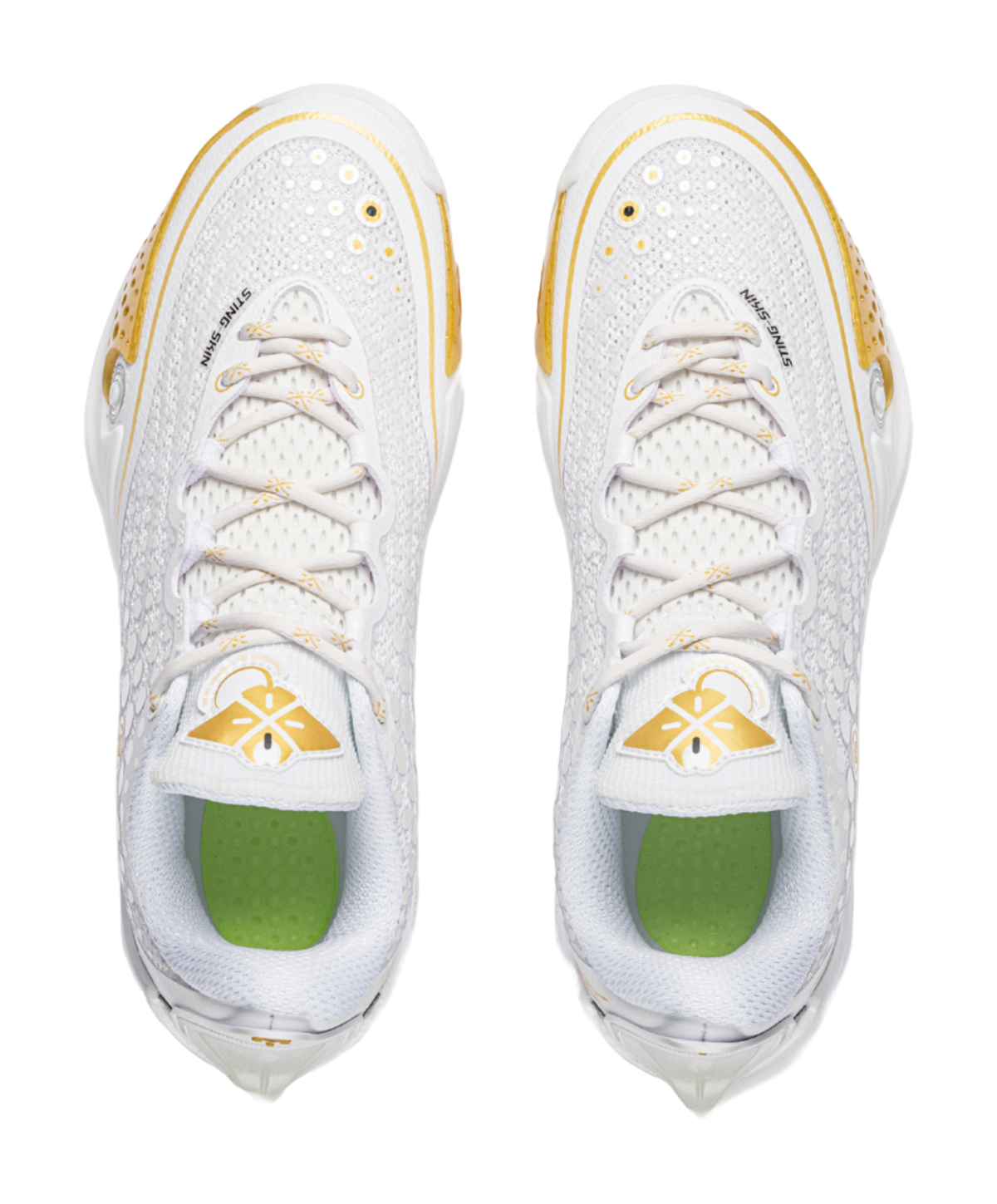 Pair low basketball shoes, white lace-up uppers with gold trim; green interior lining