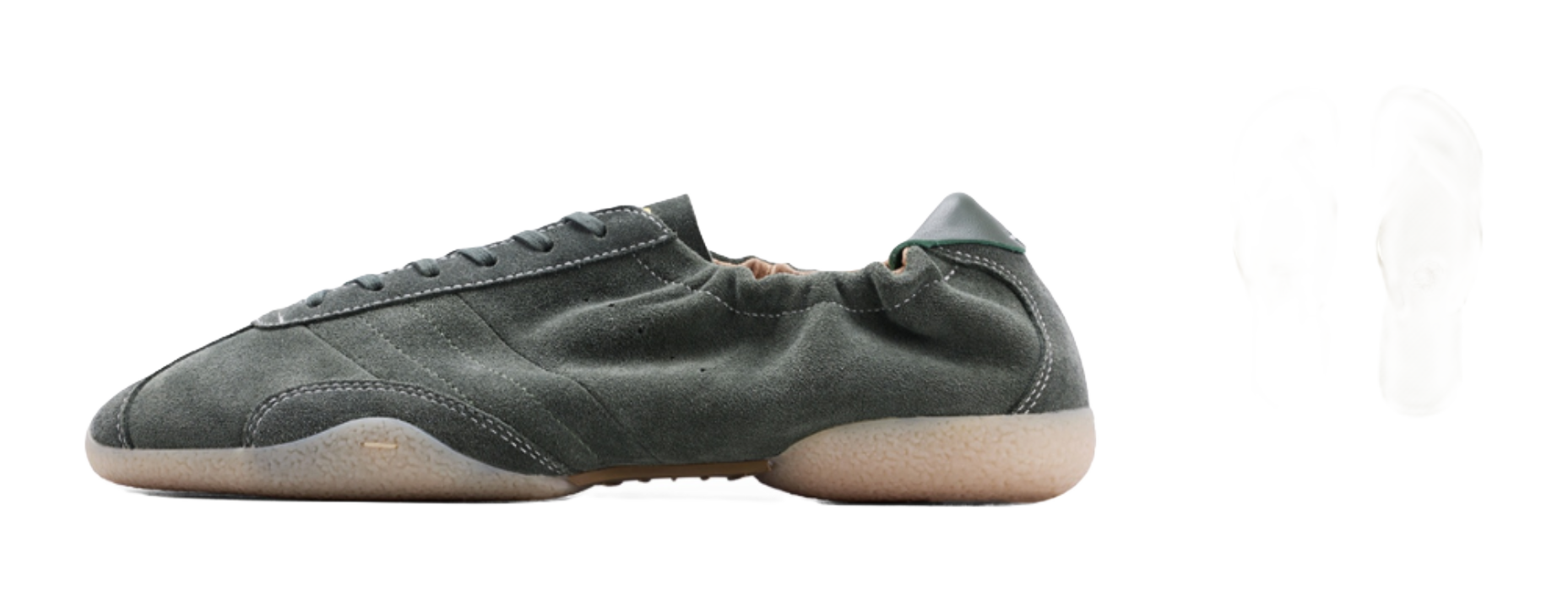 Dark green low-top sneakers with matching insole and slip-on accessory