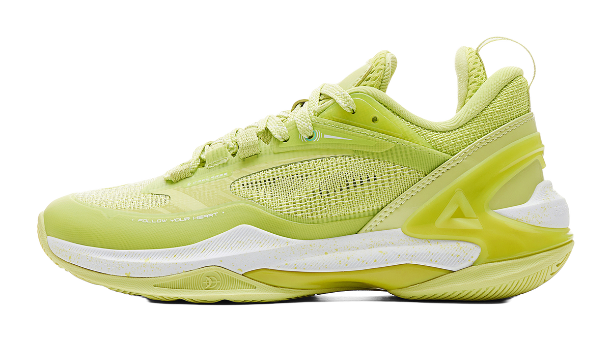 Light acid green basketball shoe with mesh upper and lace-up front, white outsole