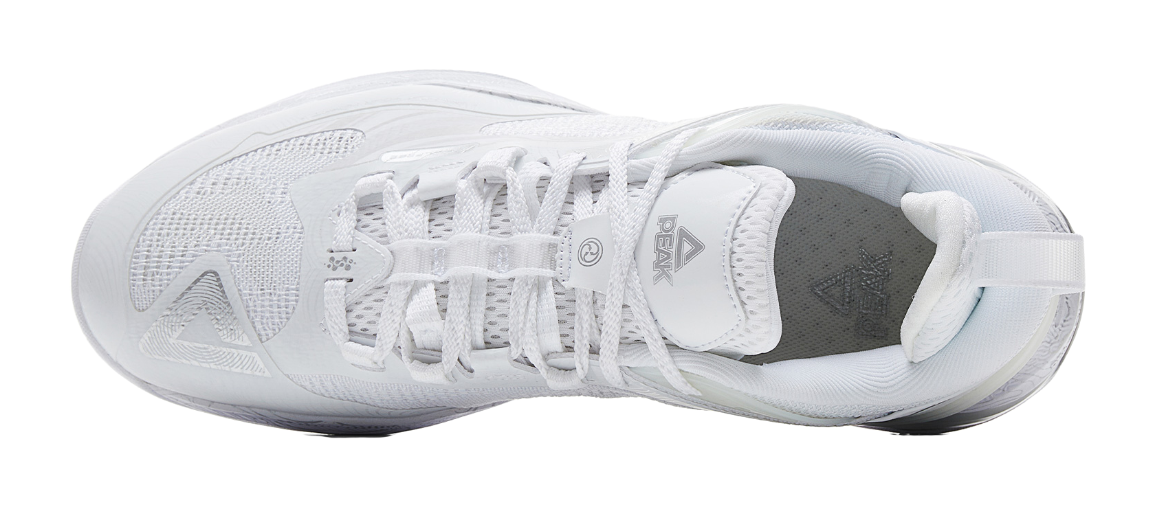 White and silver basketball shoe with laces and mesh upper; view of tongue and heel collar