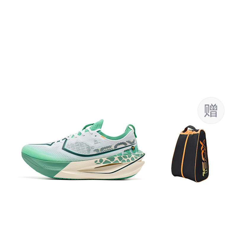Men's running shoes in white and green, shown with included black shoe bag
