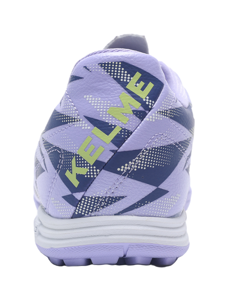 Lilac purple TF turf soccer shoes, rear view with heel pull tab and blue geometric print