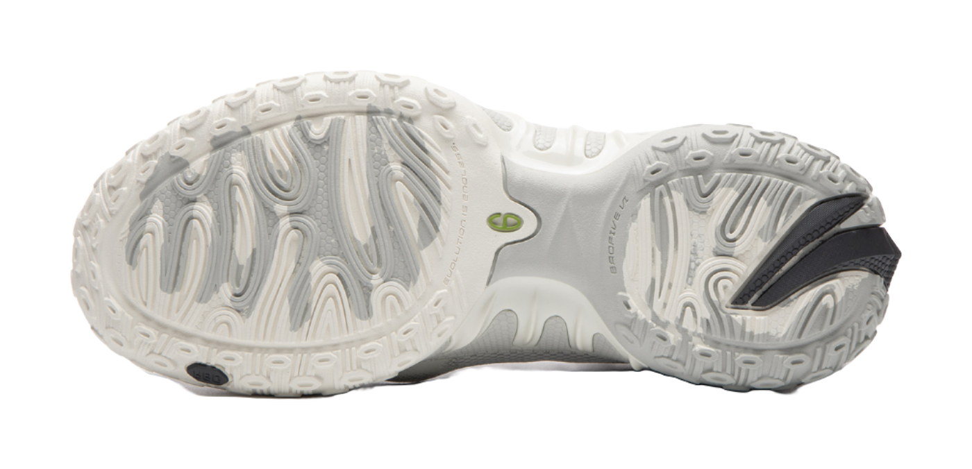 Unisex basketball shoe outsole view with deep tread grooves and green logo mark