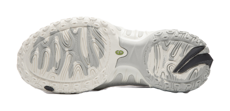 Unisex basketball shoe outsole view with deep tread grooves and green logo mark